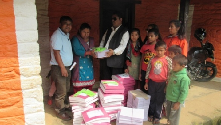 a person distributing books