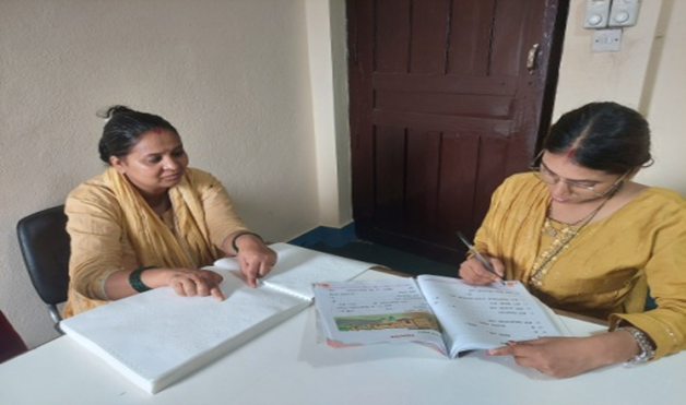 Two ladies reading book