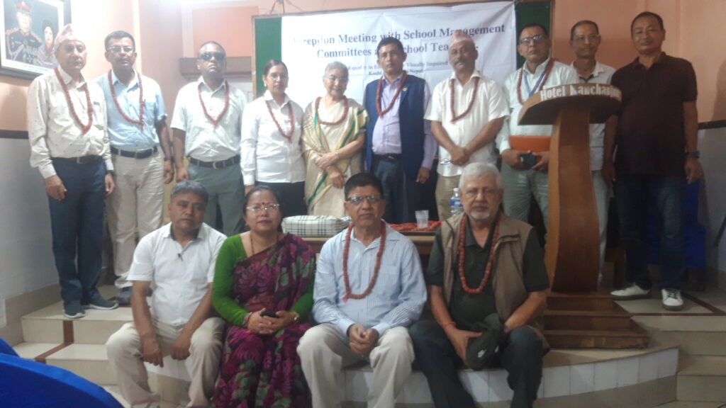 the chief guest and other guest are standing dash for the national Anrhem 