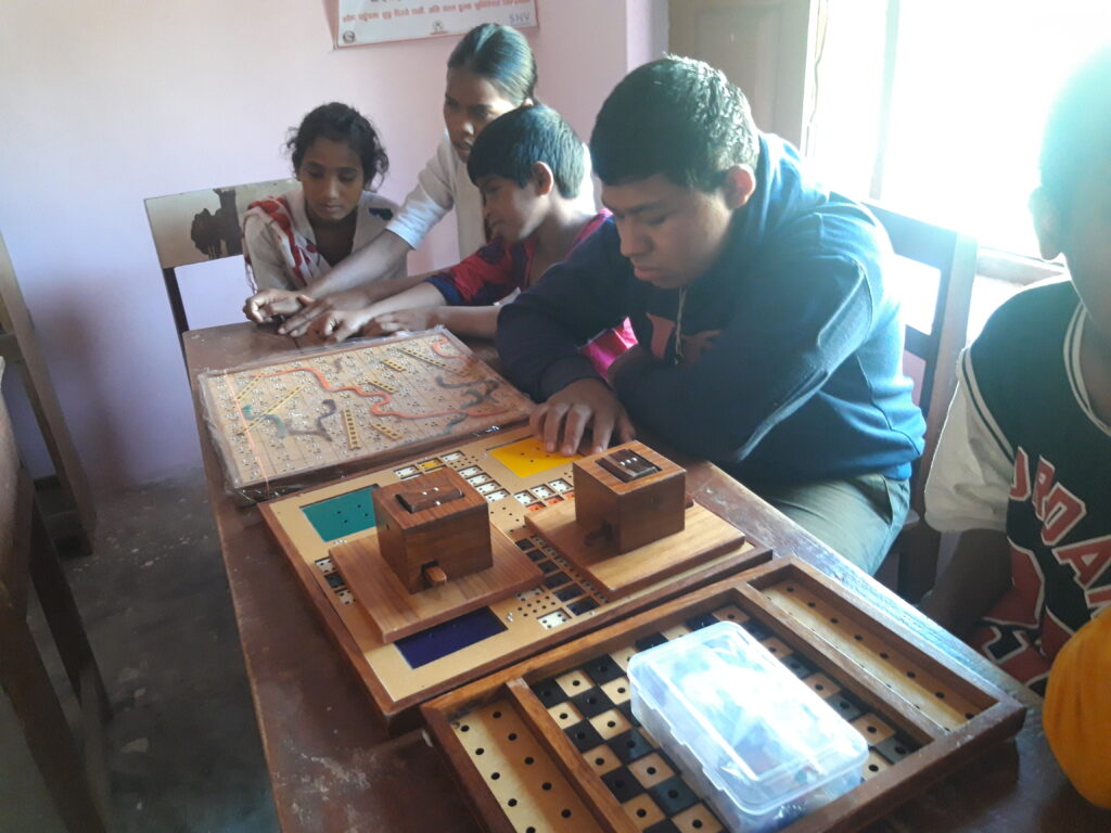 The blind students are learning indoor games at Mangal Prashad Sec School, Nepalgunj.