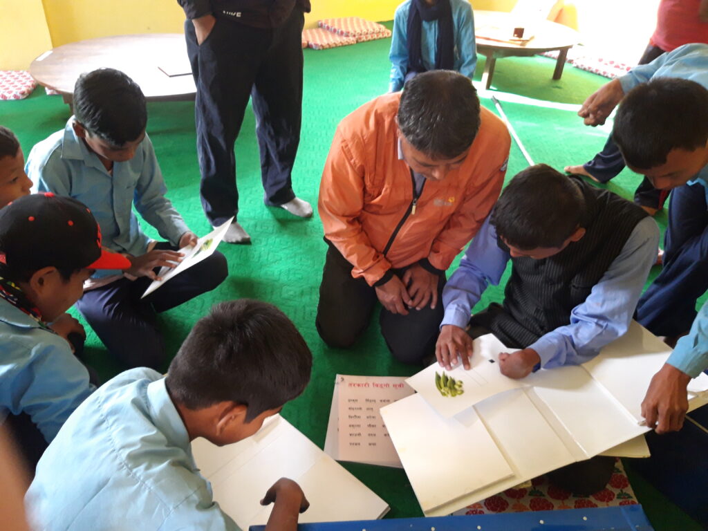 The blind students are learning games